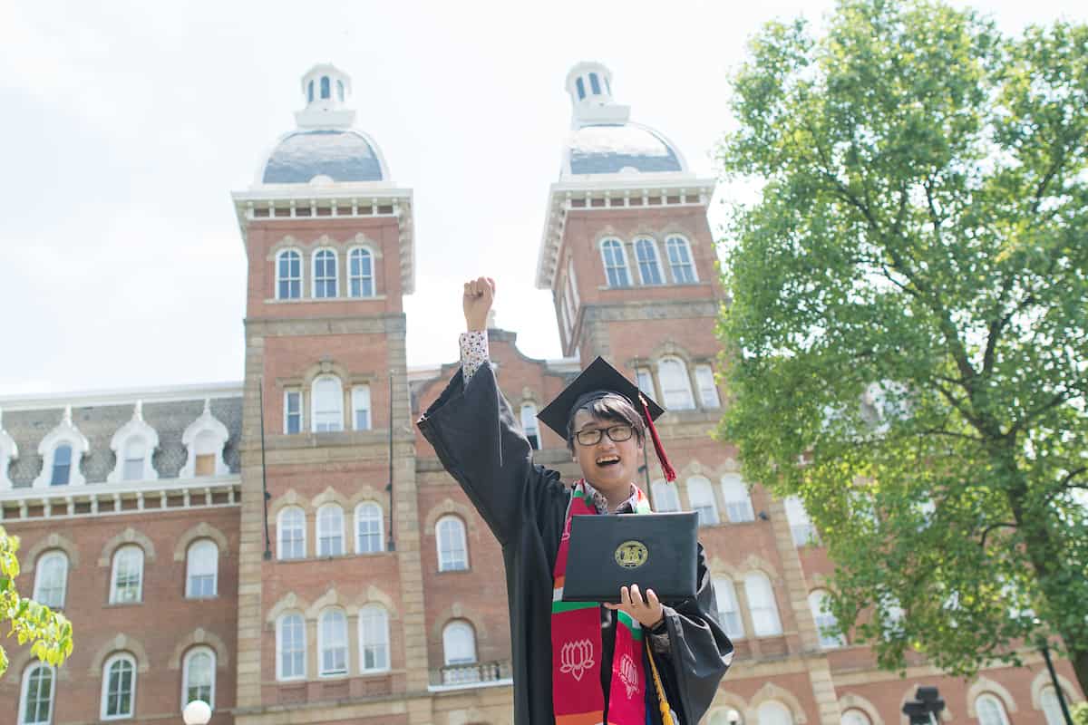 Students take photos with family and friends after the Commencement ceremony outside of Old Main May 18, 2019 on the campus of Washington &amp; Jefferson College.