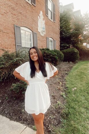 W&J senior Carlee Stelter poses in front of Delta Gamma house