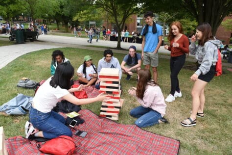 students playing jenga