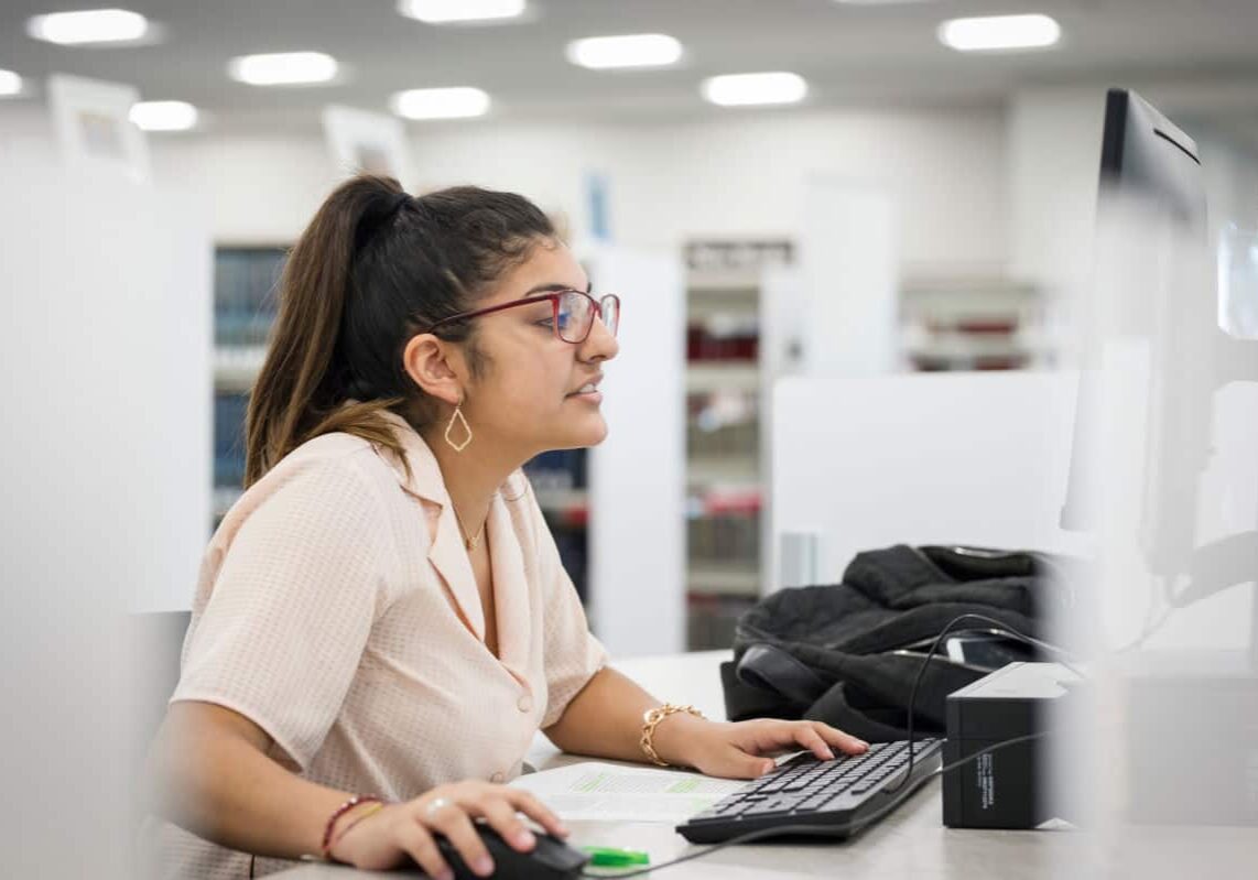 A student uses a computer in the Clark Family Library as seen October 21, 2019 during the Creosote Affects photo shoot at Washington & Jefferson College.