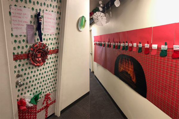 Students decorated one door to look like a wrapped present and made a faux fireplace out of construction paper in another hall. 